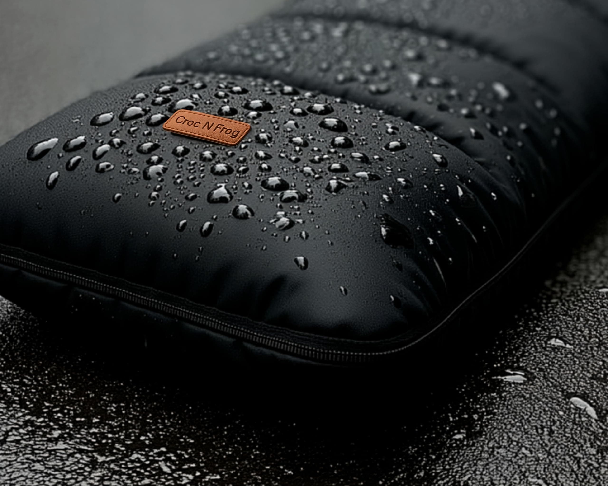 Rain beading on the waterproof shell of a Croc N Frog footmuff